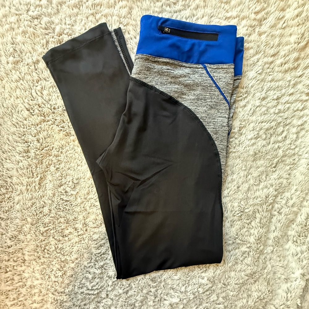 Blue and Gray Athletic Leggings w/Small Zipper Pocket 
New without tags 
Size L